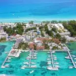Bimini Big Game Club Resort & Marina in the Bahamas featuring full-service marina with docked boats, resort amenities, beachfront location, turquoise Caribbean water, and coastal island setting